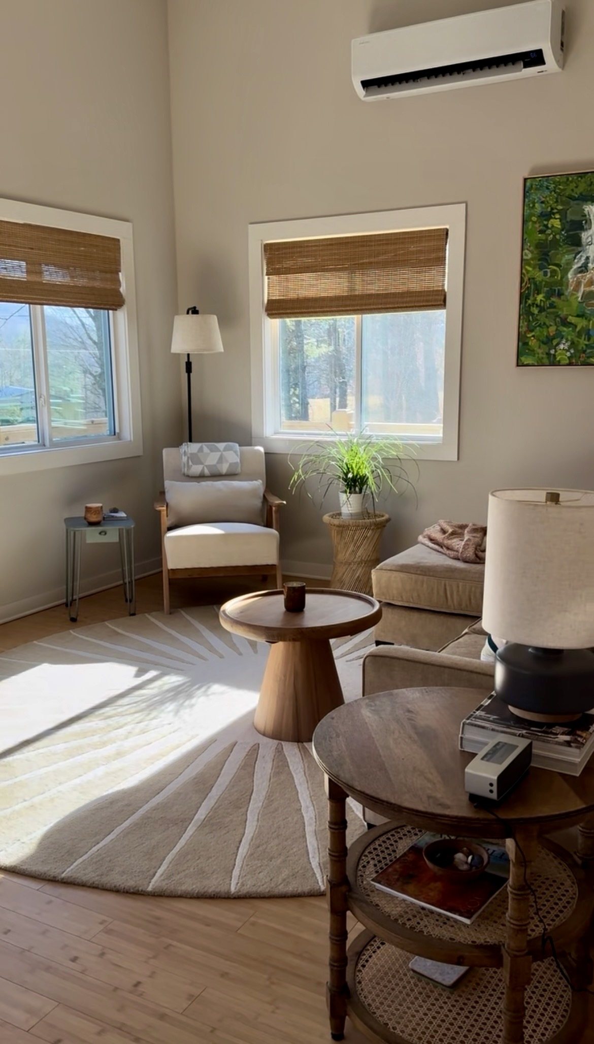 Escape Pod, living room with vaulted ceiling and tall windows