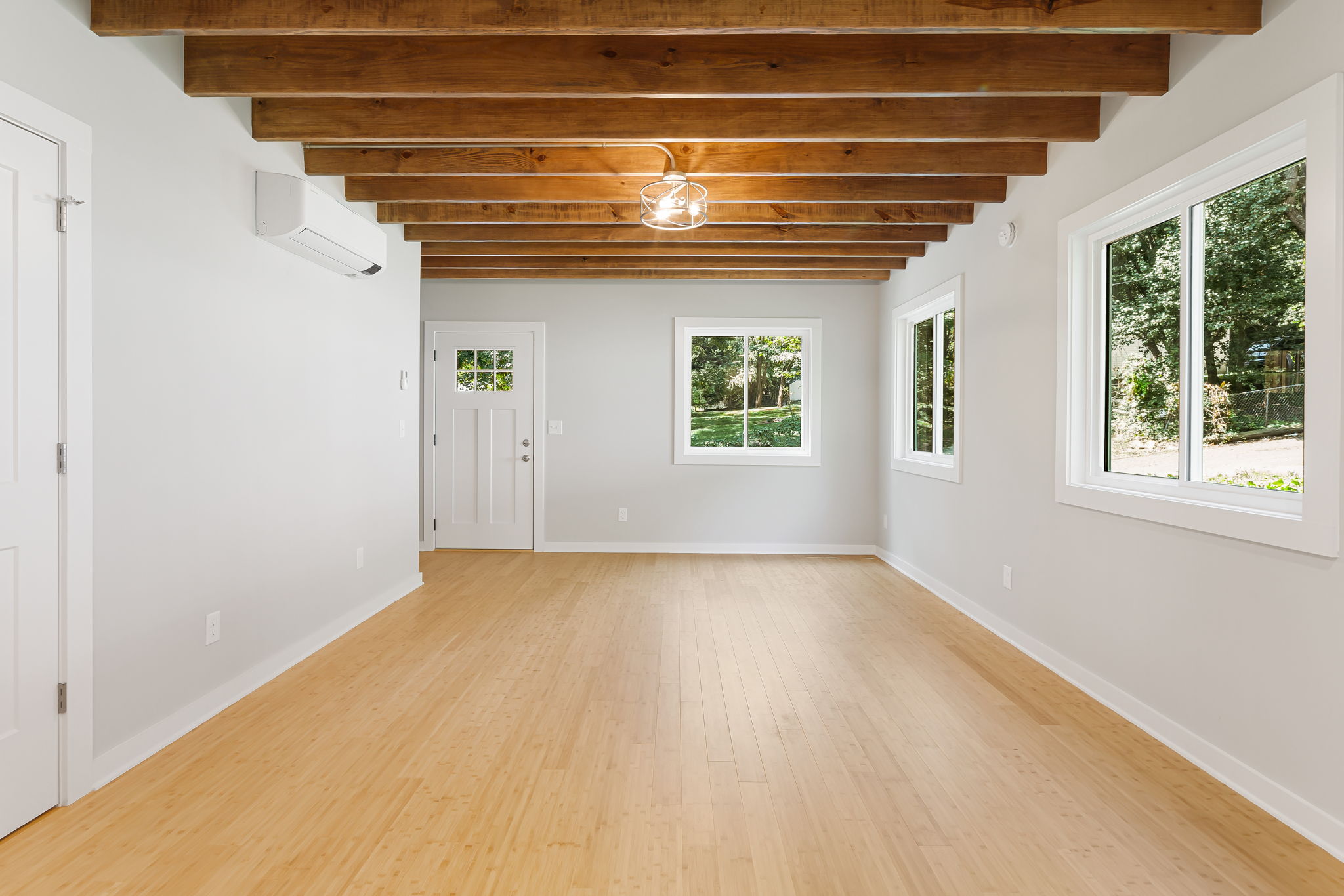 Compact Cottages exposed beam interior craftsmanship