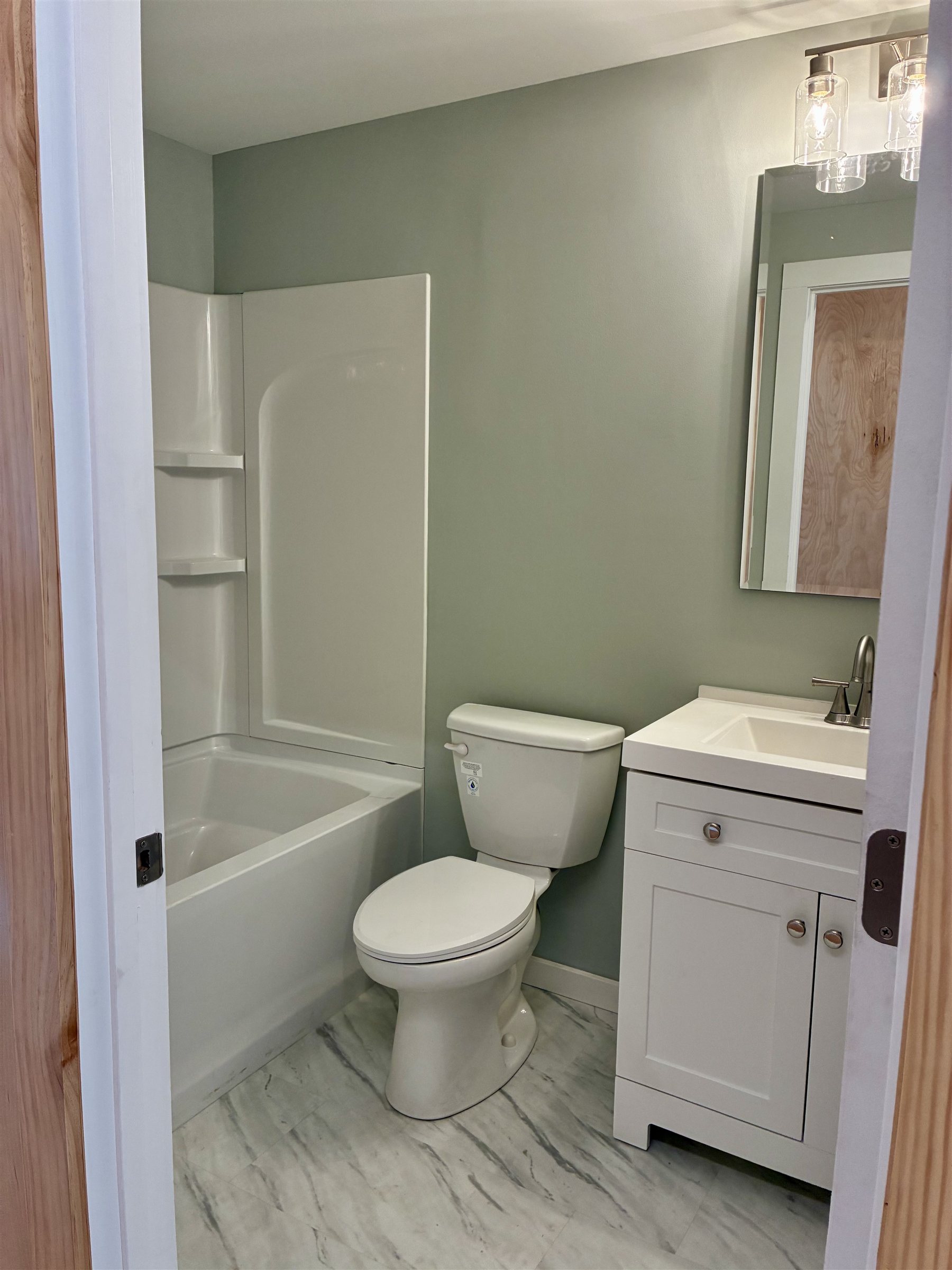 Origami Home bath pod, factory-built, tub/shower combo
